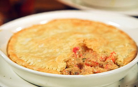 Crawfish pie served on a white plate ... beautiful!